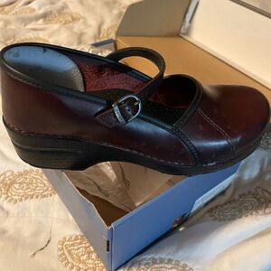 Dansko Brown Leather Clogs with Strap Detail and Chunky Sole